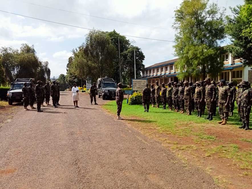 A group photo of-the 63 Kenya Army officers, staff, and students gathered during the event